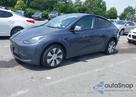 2023 Tesla Model Y Awd/Long Range Dual Motor All-Wheel Drive z USA, uszkodzony, nr VIN 7SAYGDEE8PA145857